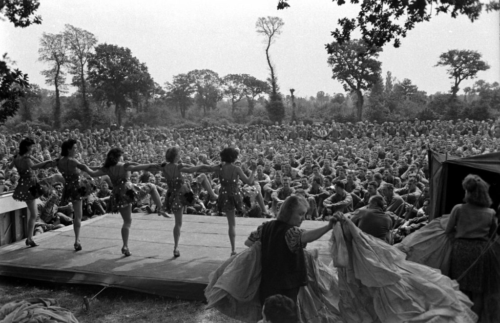 French performers in first organized show for American troops after D-Day, Normandy, July 1944.