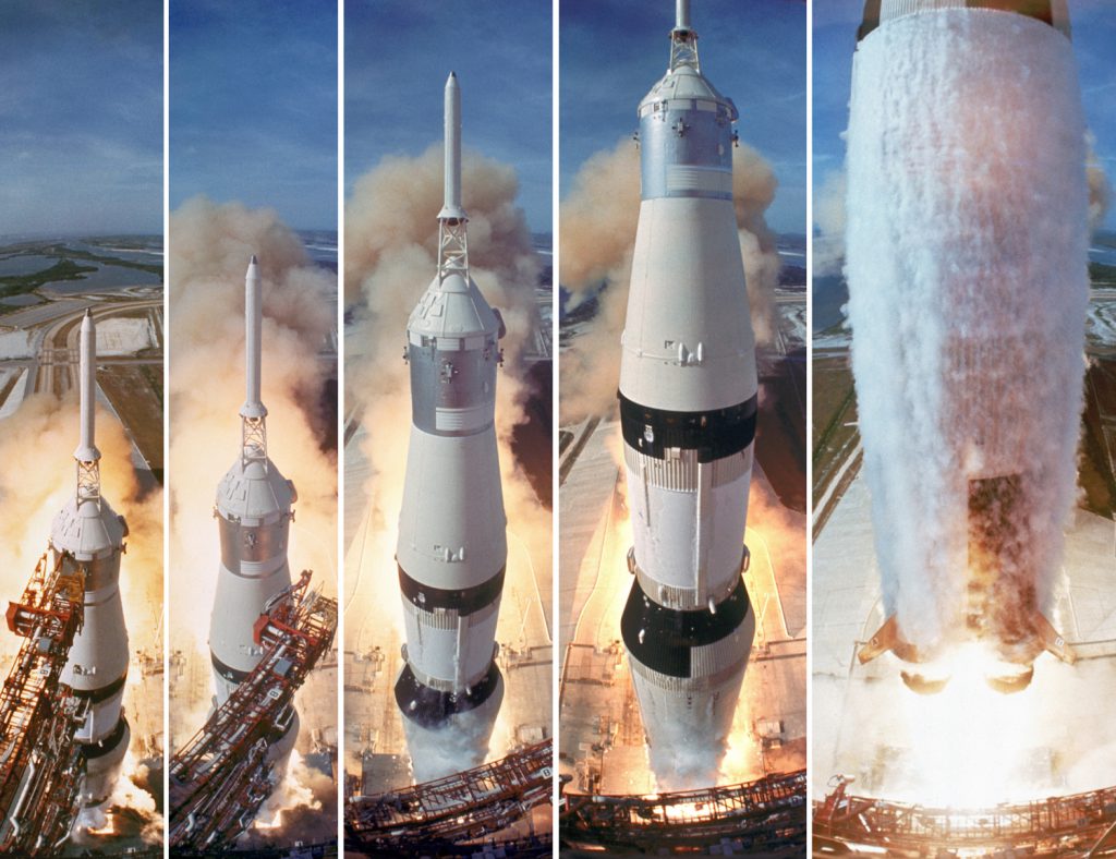 The gantry retracts while Saturn V boosters lift the Apollo 11 astronauts toward the moon, July 16, 1969.
